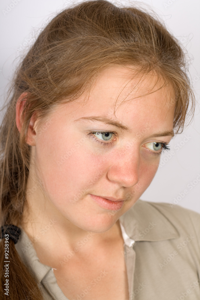 Portrait of the girl with a thoughtful glance