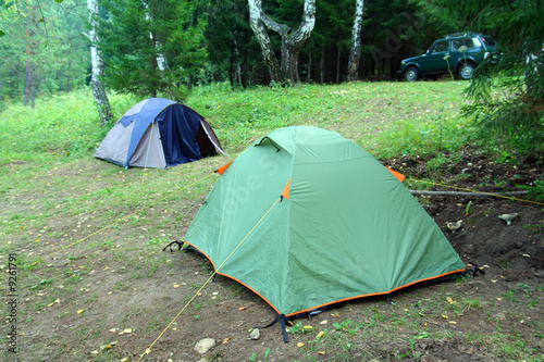 two tents outdoors - camping in forest