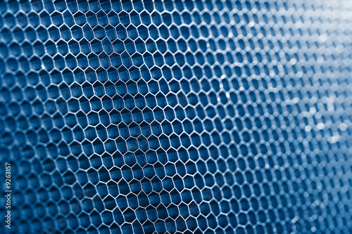 blue honeycomb grid, macro shot, shallow DOF