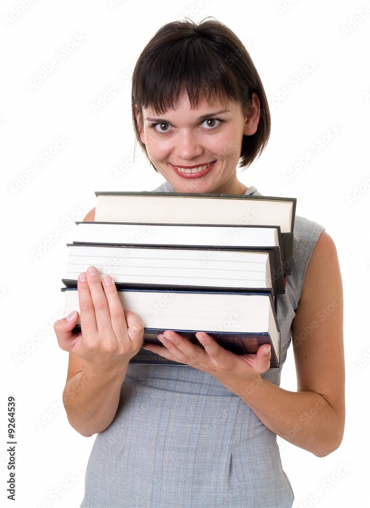 Charming student with thick books on a white background. Charming student with thick books on a white background.