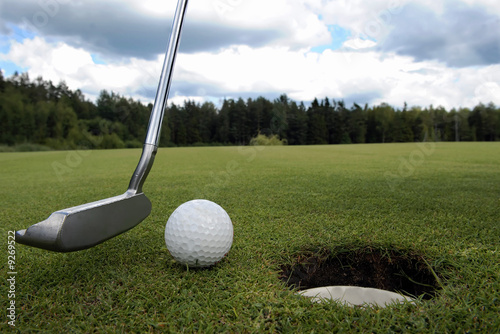 Golf putter club, ball and hole