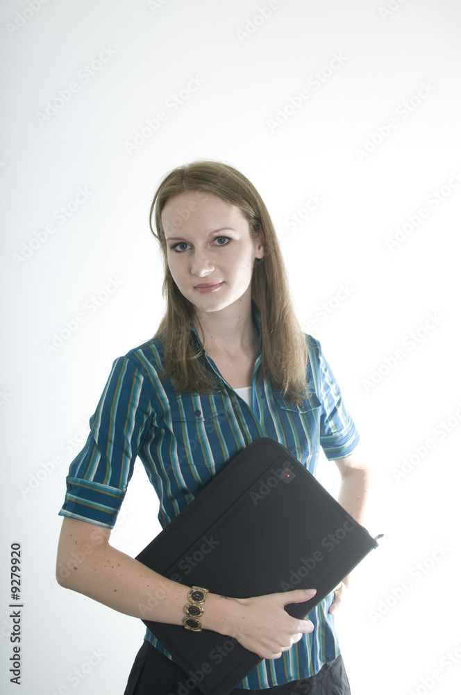 brunette working at various tasks in her office brunette working at various tasks in her office