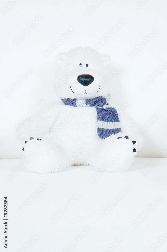 fluffy white teddy bear with scarf