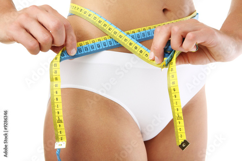 Girl measuring her body