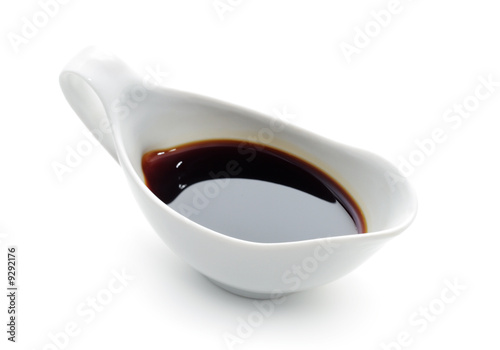 Soy Sauce in Suace-boat. Isolated over White