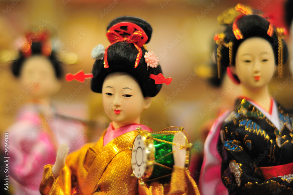 Japanese puppet wearing kimono, selective focus