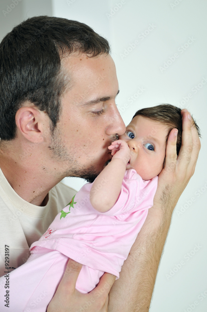 man and cute little baby indoor portrait man and cute little baby indoor portrait