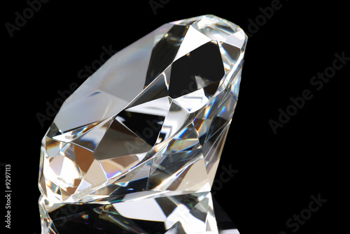 Diamond and Reflection on Black Background
