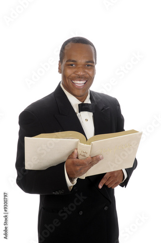 young African American preacher giving sermon,