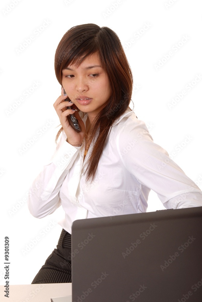 Lovely Asian business woman hard at work Lovely Asian business woman hard at work