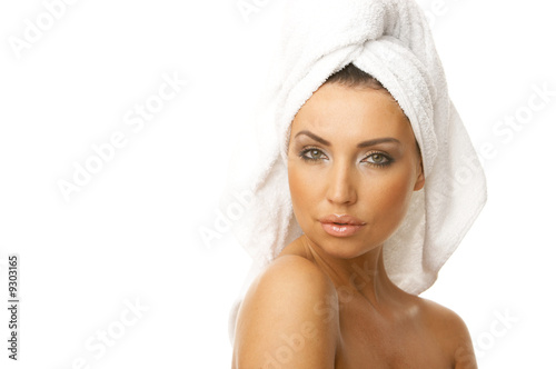 Portrait of 20-25 years old beautiful woman wearing towel