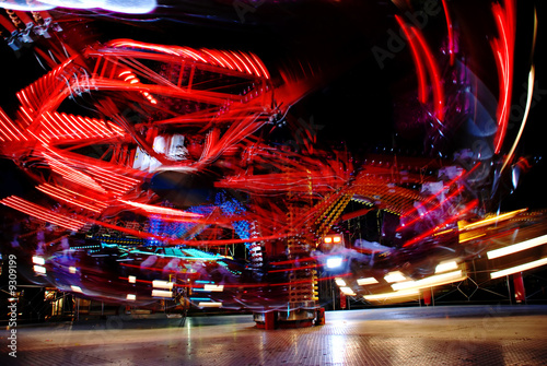 terrific speed of carousel in evening park