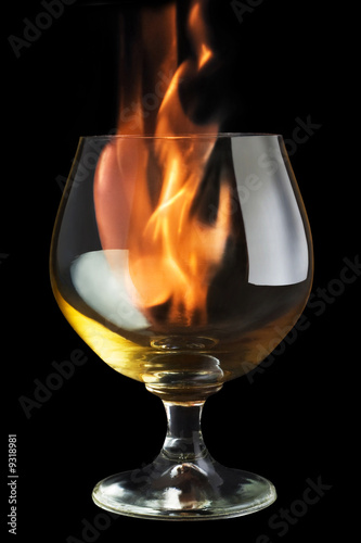 fire tongue inside glass, on black background