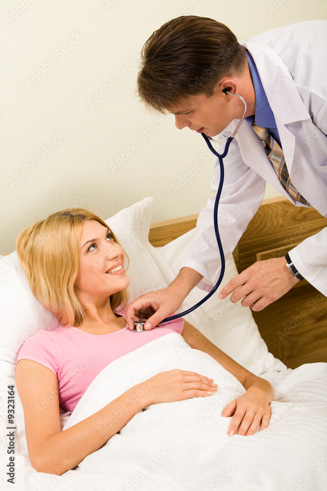 Obraz premium Image of sick young woman lying in bed