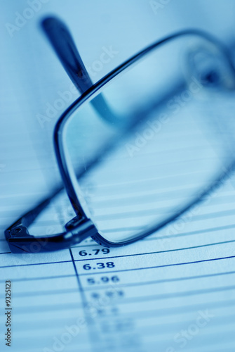 Business plan with glasses, macro photography