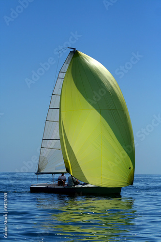 Sailing yacht with spinnaker in the wind / beautiful image