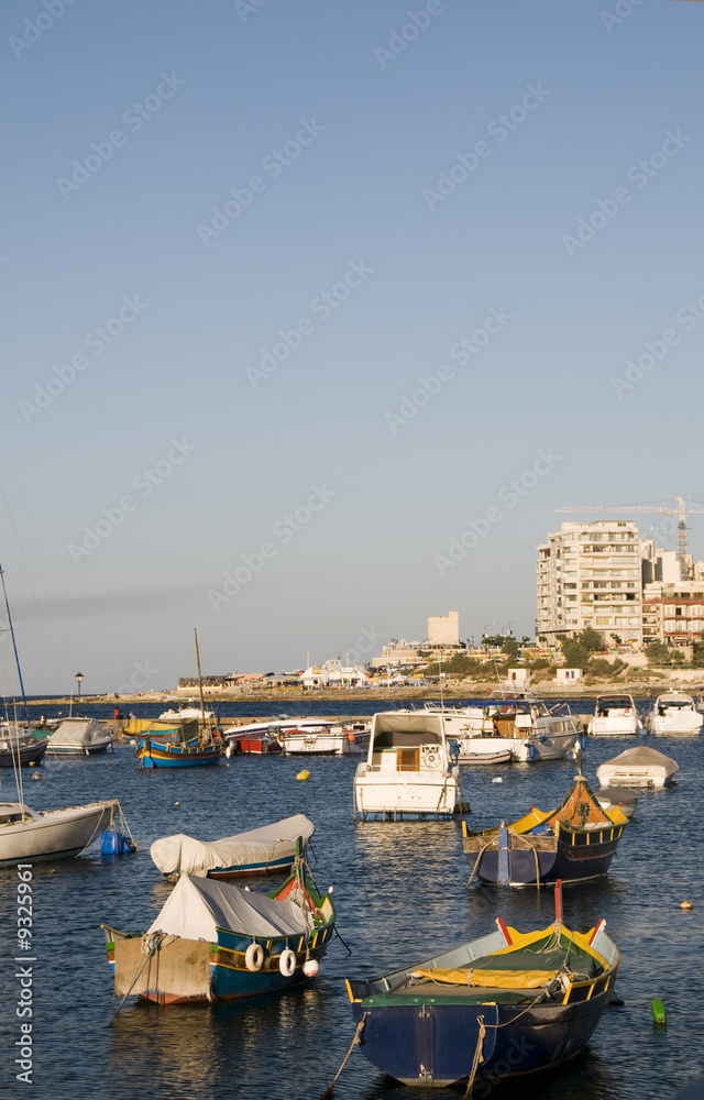 malta maltese luzzu boats in harbor overdevelopment