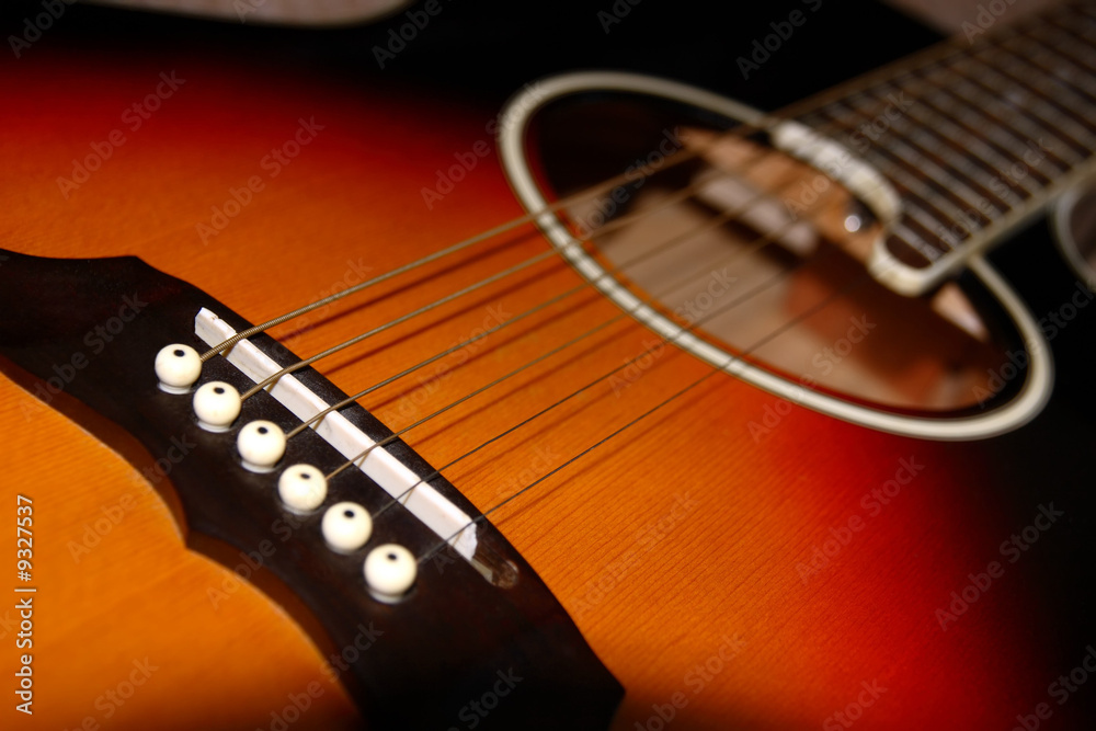 Fototapeta premium an abstract close up of an acoustic guitar