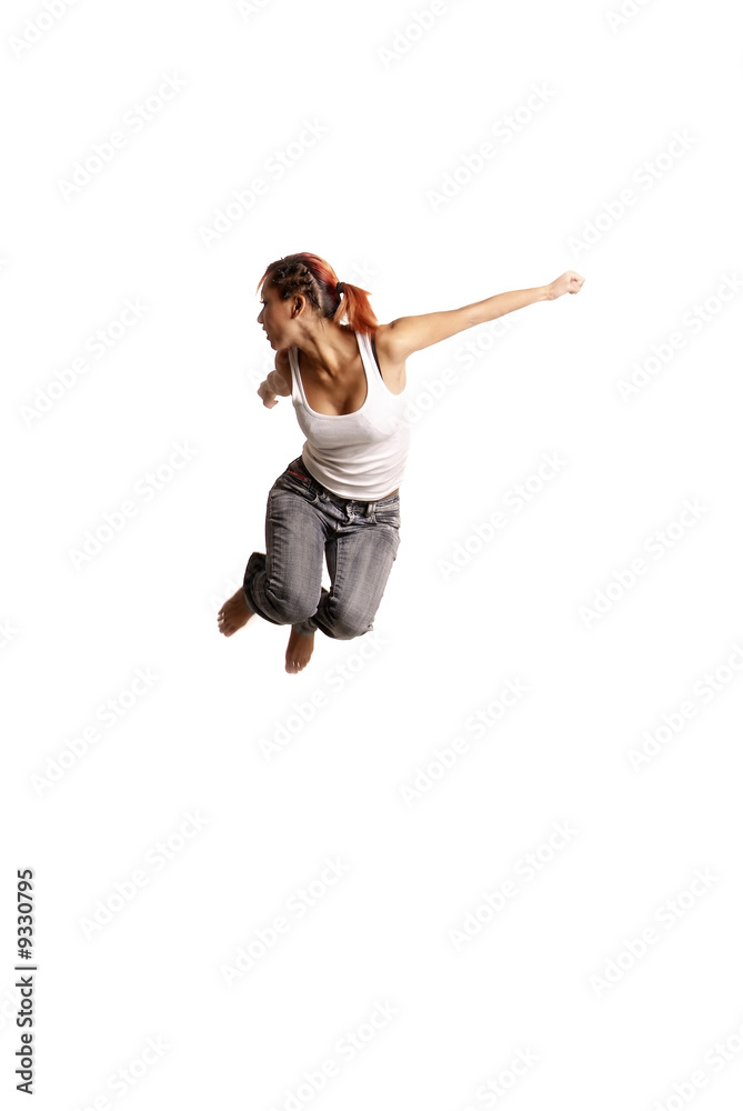 young woman jumps in front of white background