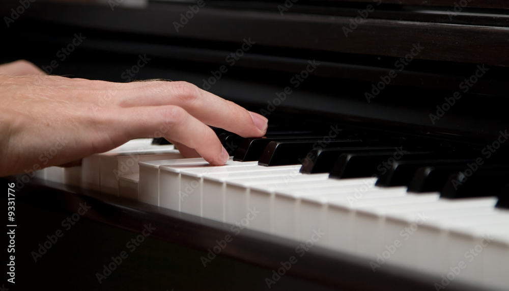 Fototapeta premium I music maker! Closeup photo of piano player mans handle.