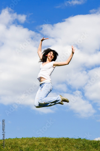 pretty young woman is jumping