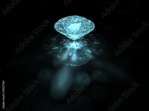 A bluish brilliant cut diamond on dark background