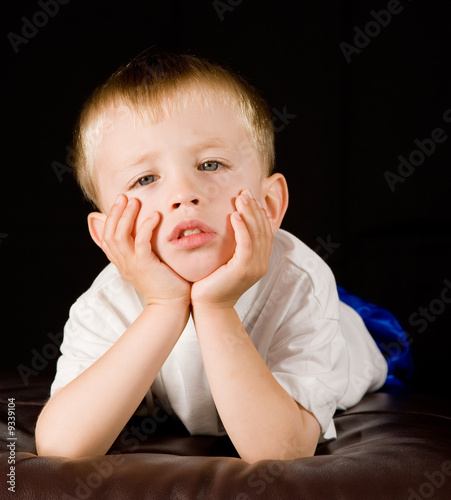Child on black background