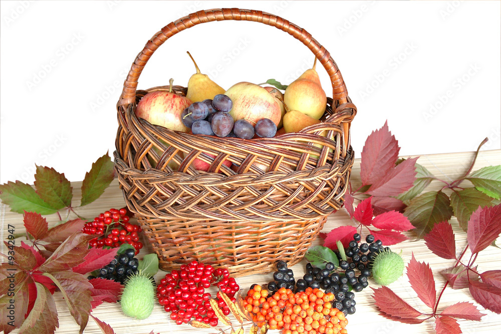 Autumn fruit and berries in a basket