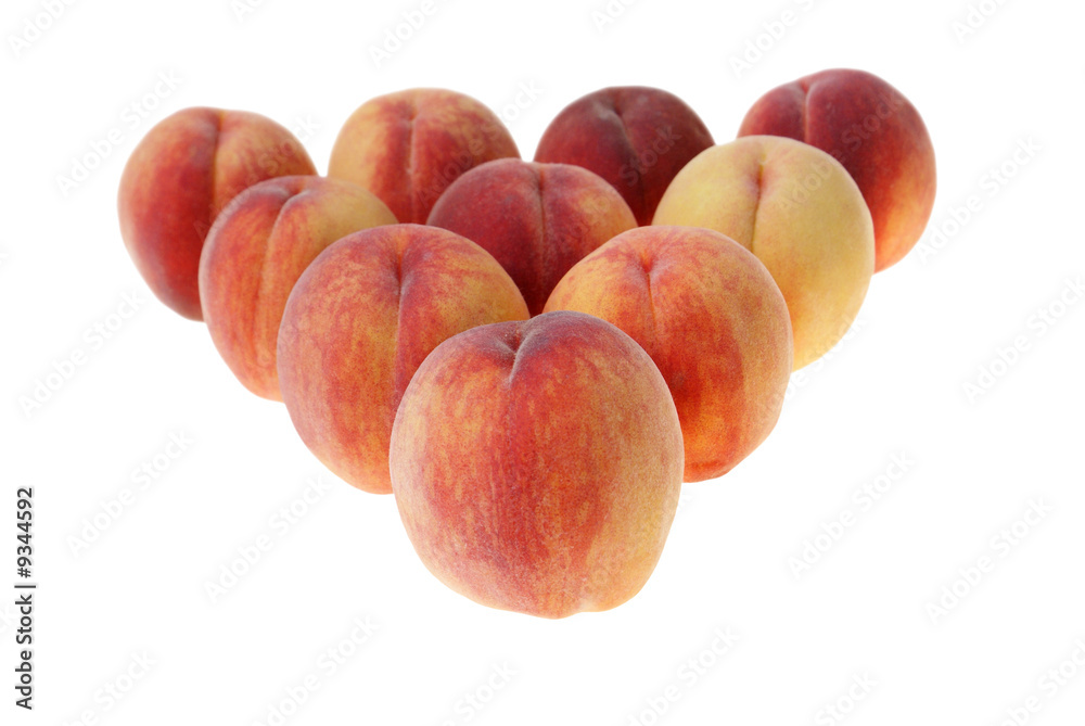 big peaches arranged in triangle isolated on white background big peaches arranged in triangle isolated on white background
