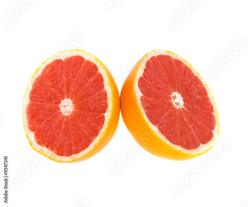 Sliced grapefruit on white background