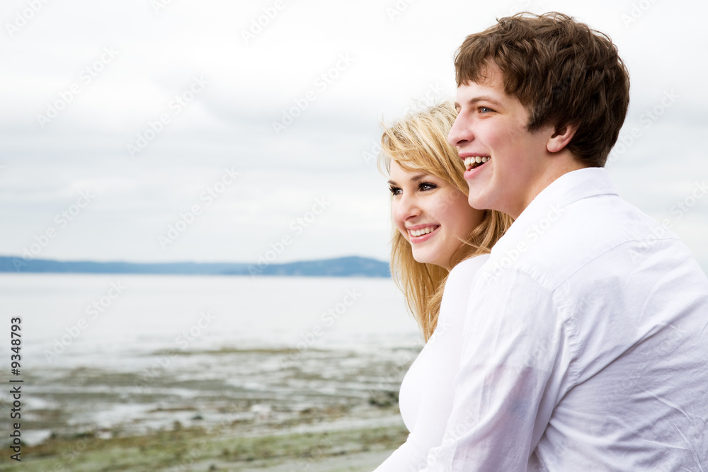 A caucasian couple in love on the beach A caucasian couple in love on the beach