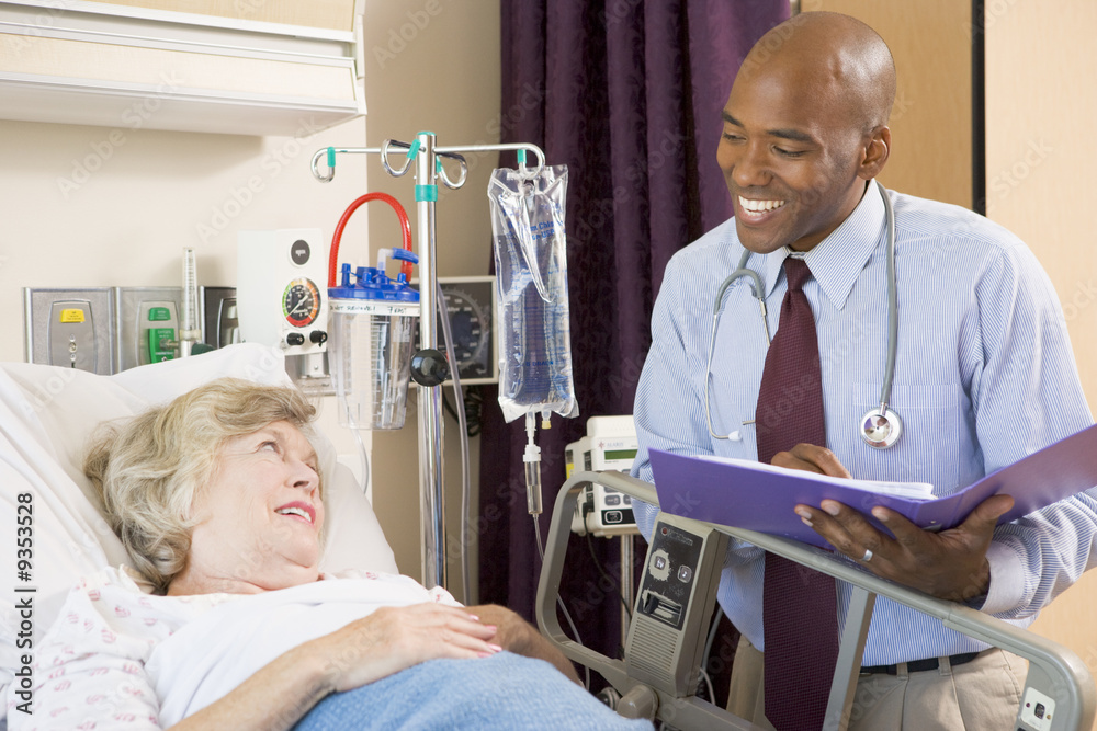 Doctor Making Notes About Patient Doctor Making Notes About Patient