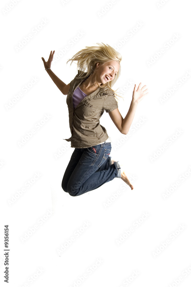 jumping teenage girl is having lots of fun