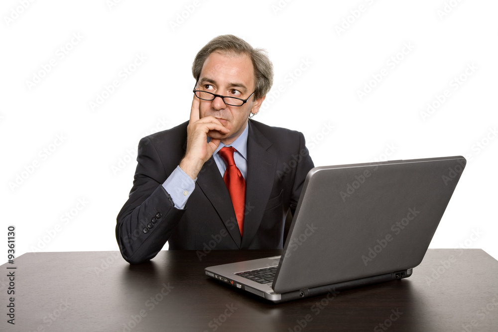 mature business man working with his laptop mature business man working with his laptop
