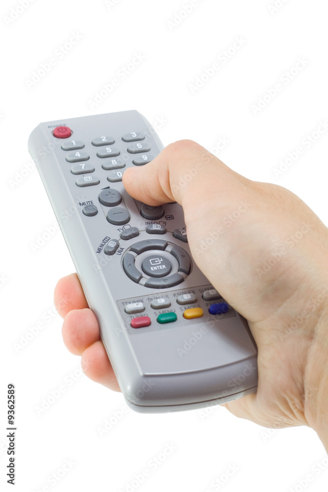 Remote control in hand isolated on white, finger pushing buttons Remote control in hand isolated on white, finger pushing buttons
