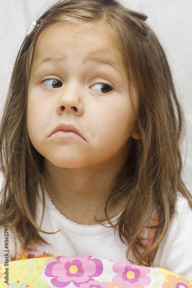 portrait of a little girl making faces portrait of a little girl making faces