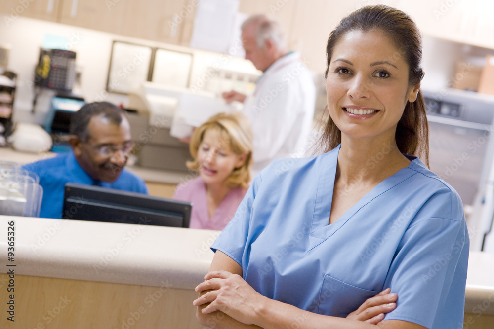 Doctors And Nurses At The Reception Area Of A Hospital Doctors And Nurses At The Reception Area Of A Hospital
