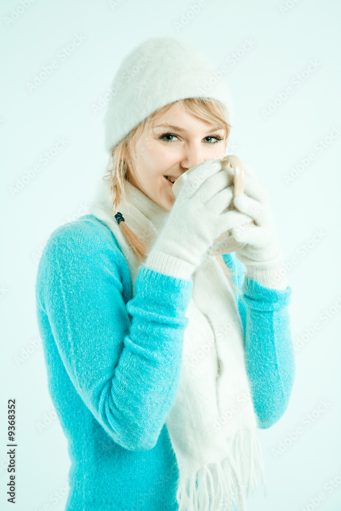 A beautiful caucasian girl drinking hot coffee A beautiful caucasian girl drinking hot coffee