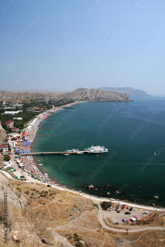 View at Sudak city and gulf with beach on Crimea Ukrain