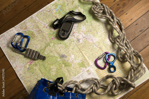 view of adventure gear including map and GPS