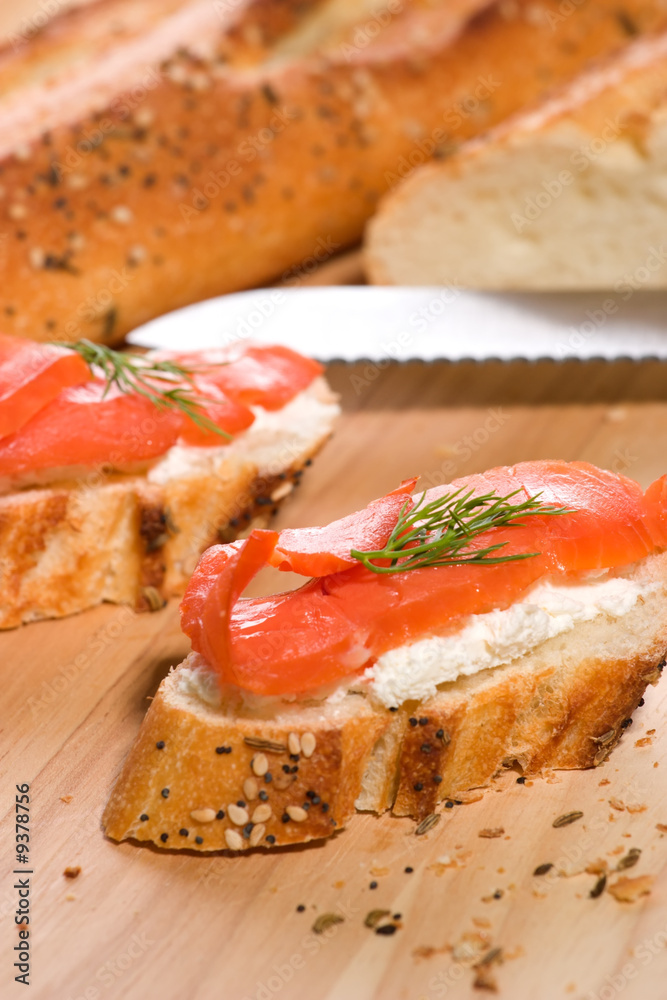 canape with smoked salmon, cream cheese spread and dill