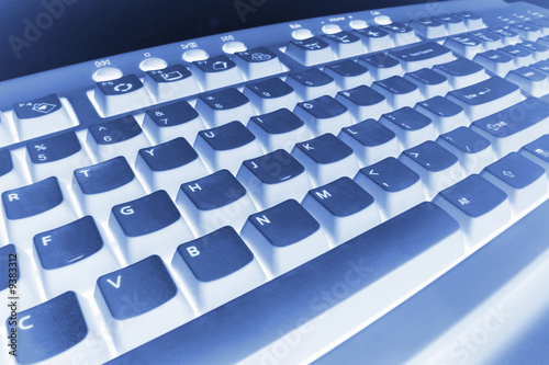 Close Up of Computer Keyboard in Blue Tone