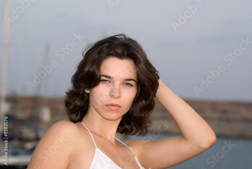 Outdoors portrait of young adult beautiful woman