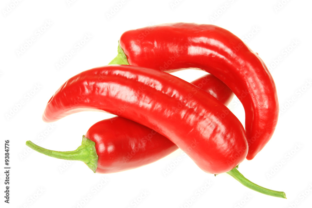 Red, ripe peppers. Vegetables isolated on white. Red, ripe peppers. Vegetables isolated on white.