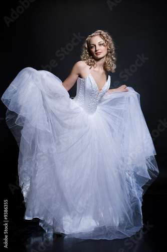Young attractive woman in wedding dress