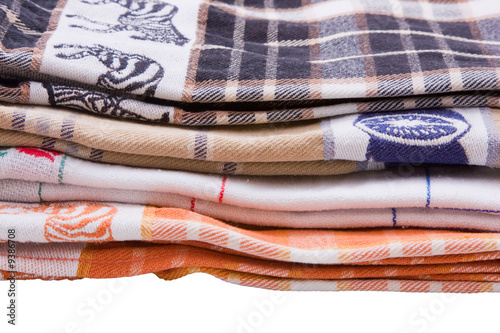 A stack of tea towels on a white background