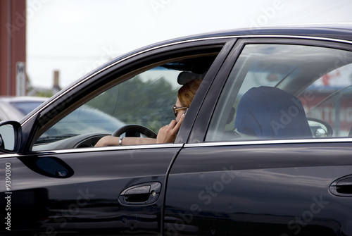 Woman talking on cell phone while driving
