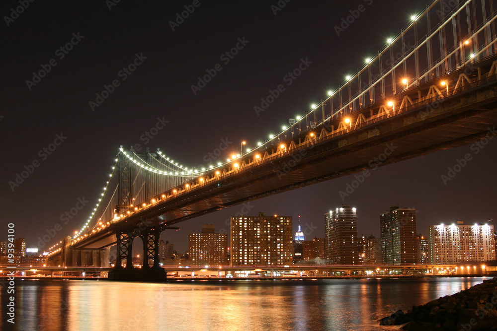 Manhattan Bridge and Manhattan skyline At Night, NYC