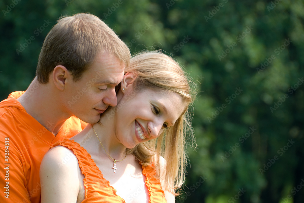 Loving couple on a summer nature Loving couple on a summer nature