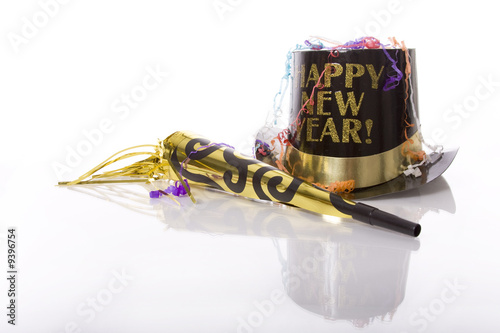 Party favors including top hat that says Happy New Year